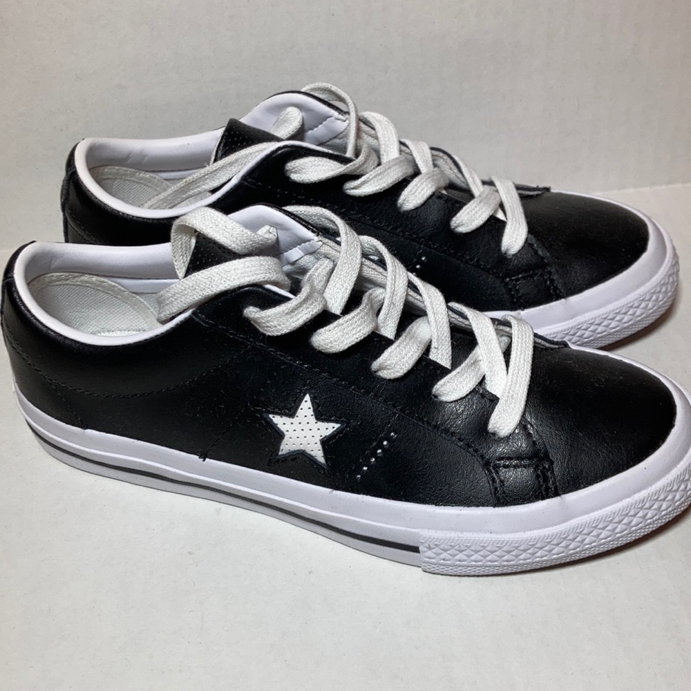 Brand New Black & White leather Converses.